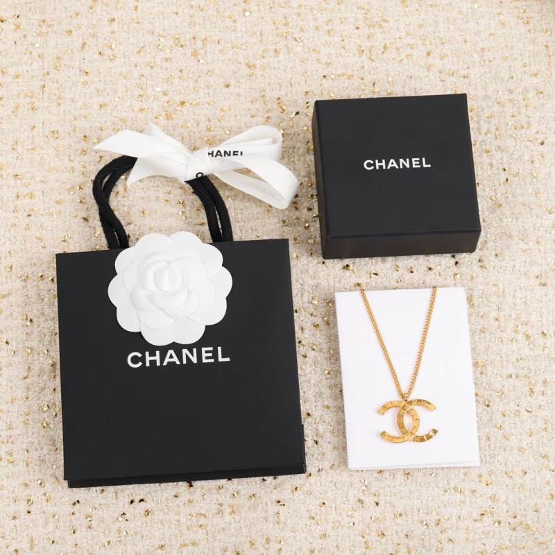 Ch*el brooches
